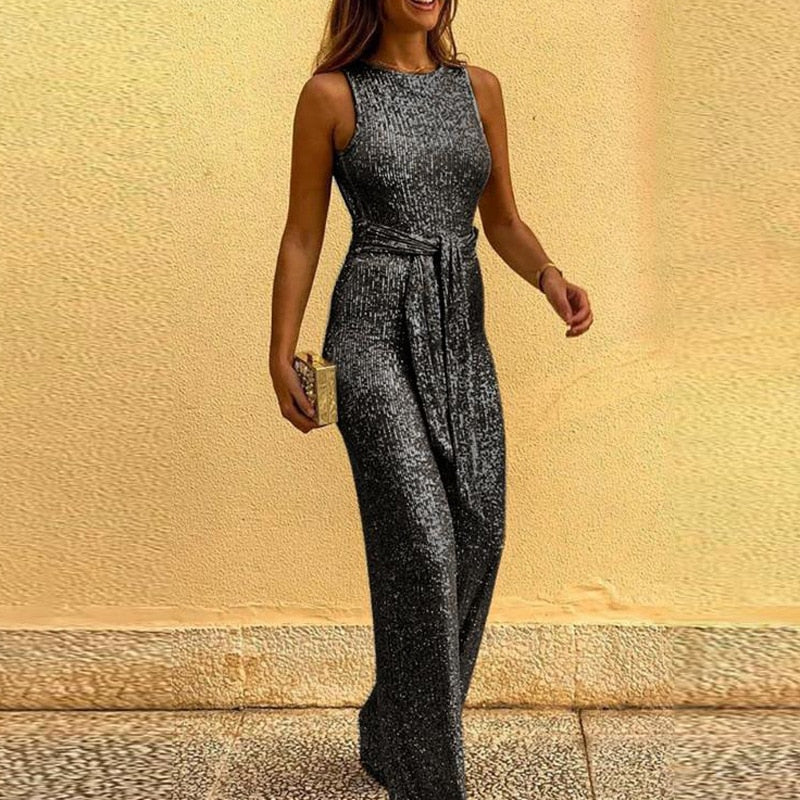 Jumpsuit glitters open schouders en rug